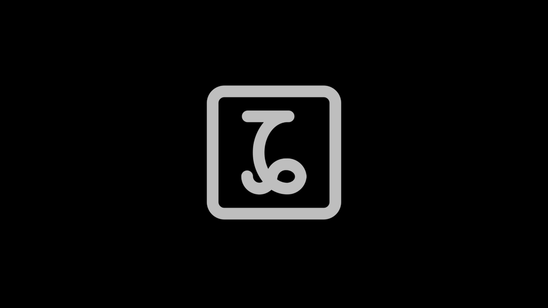 Gray Capricorn zodiac symbol centered on a black background.